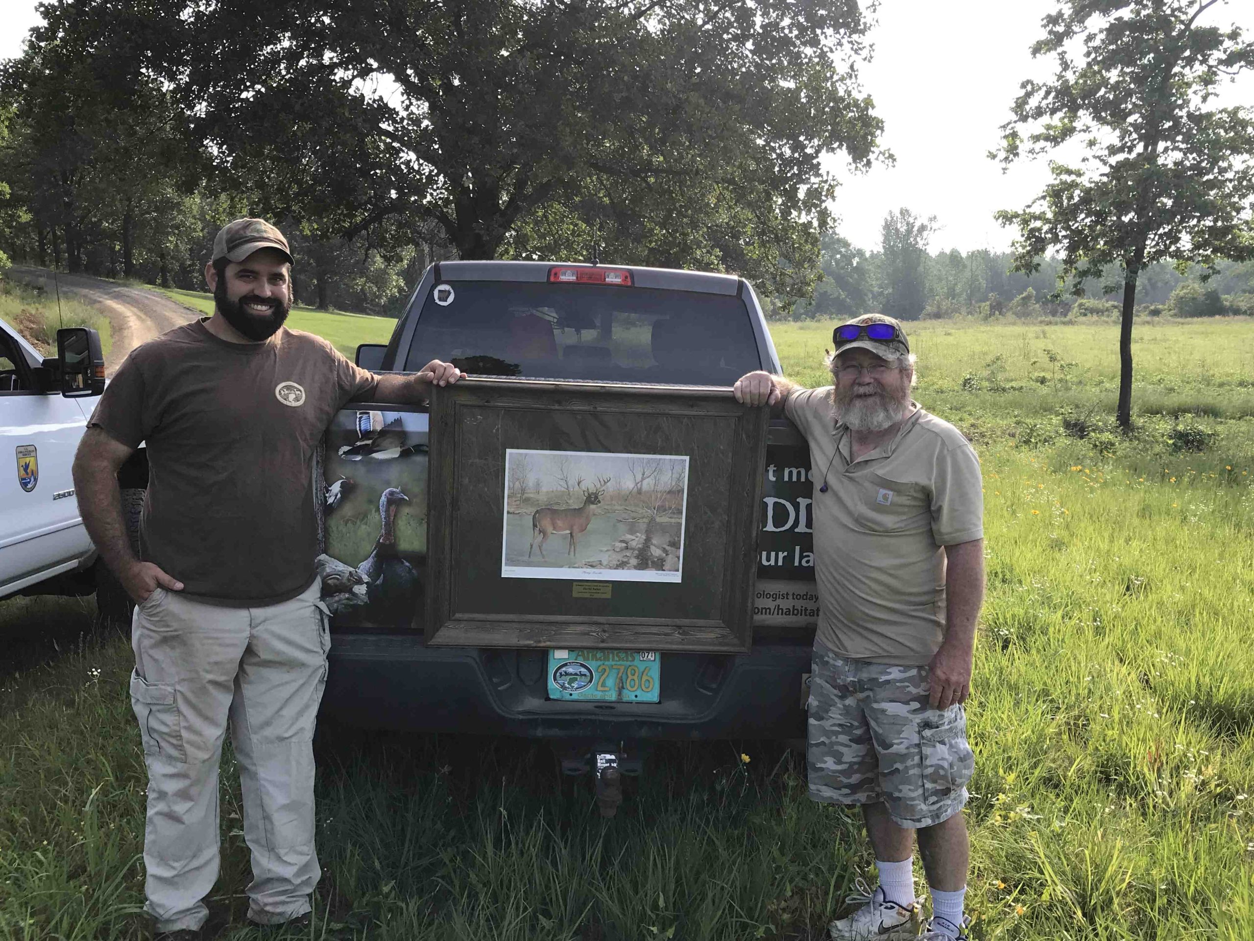 Private lands biologists in Arkansas receiving awards for their outreach work.